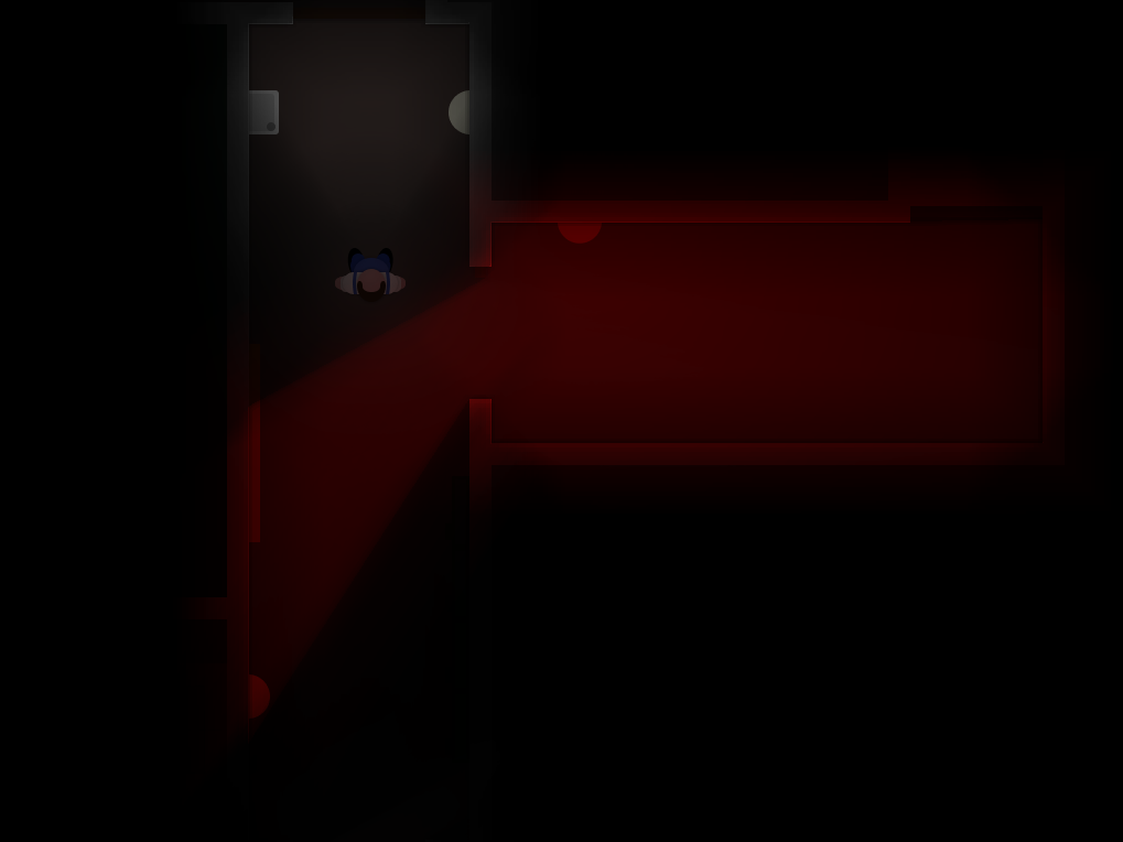 Screenshot of the player in a dark corridor